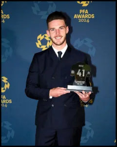 Declan Rice with an award