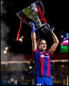 Alexia Putellas with the trophy