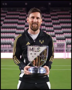 Lionel Messi with an award