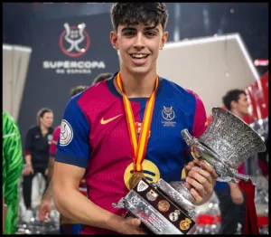 Marc Bernal with the trophy