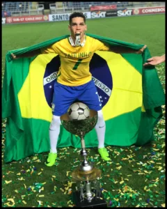 Paulinho with champions trophy