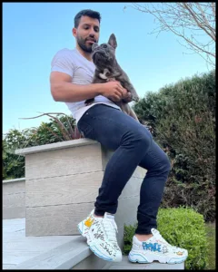 Sergio Agüero with his puppy